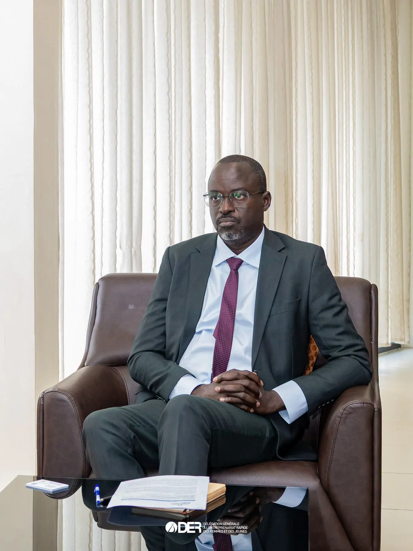 Abdoulaye Niane en costume, lors d’une rencontre